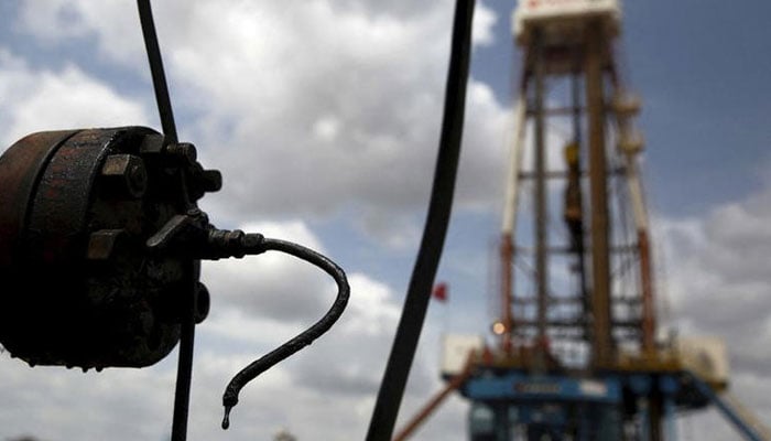 Crude oil drips from a valve at an oil well operated by Venezuelas state oil company PDVSA, in the oil rich Orinoco belt, near Morichal at the state of Monagas April 16, 2015. — Reuters