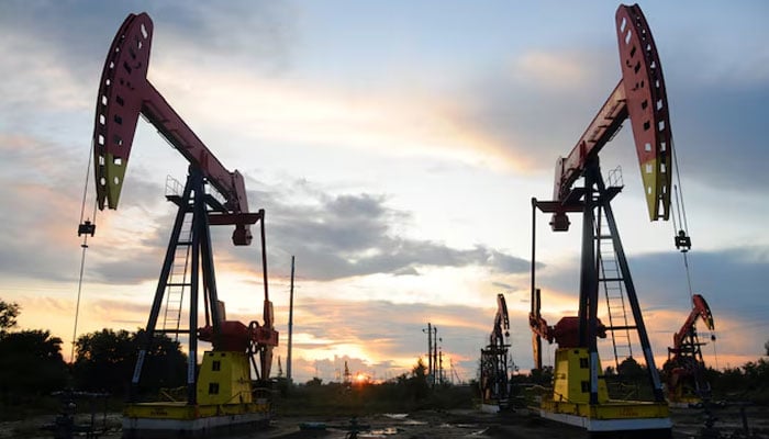 Pumpjacks are seen during sunset at the Daqing oil field in Heilongjiang province, China on August 22, 2019.  — Reuters