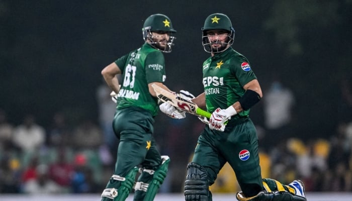 Pakistan captain Salman Agha (left) and Sahibzada Farhan run between the wickets during their first T20I against Sri Lanka at the Rangiri Dambulla International Stadium, January 7, 2025. — PCB