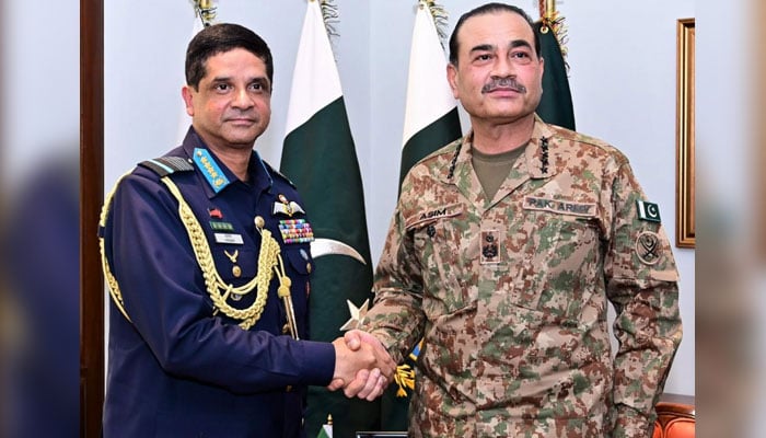 Bangladesh’s Chief of Air Staff Air Chief Marshal Hasan Mahmood Khan (left) shakes hand with Field Marshal Syed Asim Munir at the General Headquarters (GHQ) in Rawalpindi on January 8, 2025. — ISPR