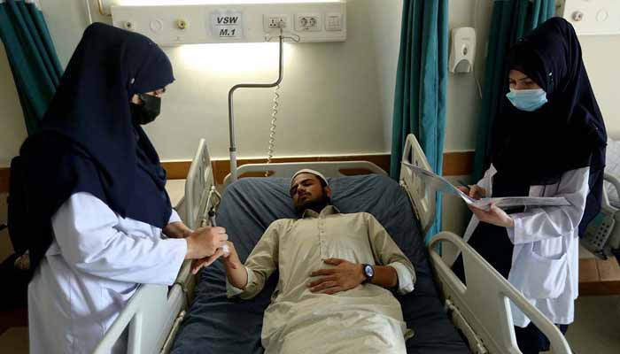 Nursing staff attend to a patient as part of their duties on International Nurses Day at a hospital on May 12, 2025. — APP