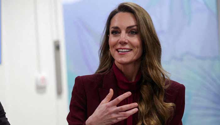 Princess of Wales Catherine speaks with healthcare staff during a visit to Charing Cross Hospital in west London on January 8, 2026, to highlight the work of NHS staff and volunteers. — AFP