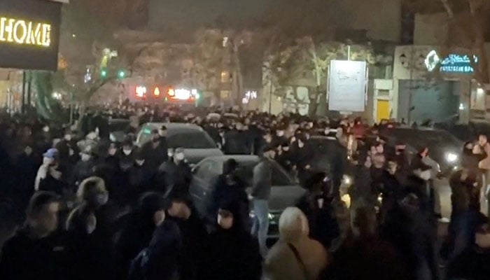 People gather on the streets amid anti-government unrest in Tehran, Iran, in this still image obtained from social media video released on January 8, 2026. — Reuters
