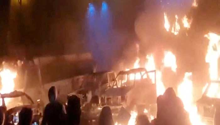 Protesters gather as vehicles burn, amid evolving anti-government unrest, in Tehran, Iran, in this screengrab obtained from a social media video released on January 9, 2026. — Reuters