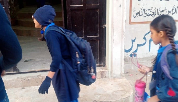 Students going to school after the end of winter vacation in Malir area, Karachi, January 5, 2026. — PPI