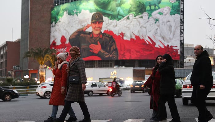 People walk on a street as protests erupt over the collapse of the currencys value in Tehran, Iran, January 2, 2026. — Reuters