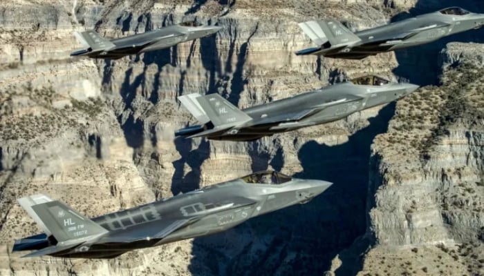 A formation of US Air Force F-35 Lightning II fighter jets perform aerial manoeuvres as part of a combat power exercise over Utah Test and Training Range, Utah, US. — Reuters/File