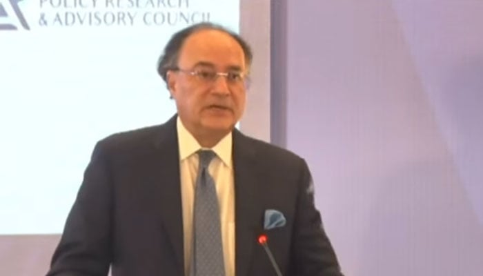 Finance Minister Muhammad Aurangzeb addressing the Pakistan Policy Dialogue in Islamabad on January 14, 2026. — Screengrab via Geo News