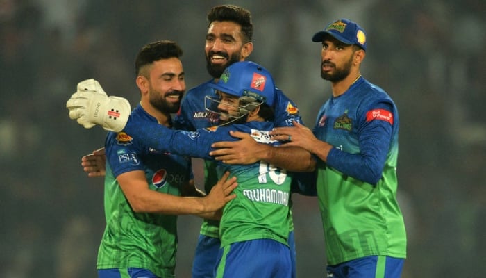 Multan Sultans cricketers celebrate after the dismissal of Karachi Kings Haider Ali during the Pakistan Super League (PSL) T20 cricket match at the Multan Cricket Stadium in Multan on February 22, 2023. — AFP