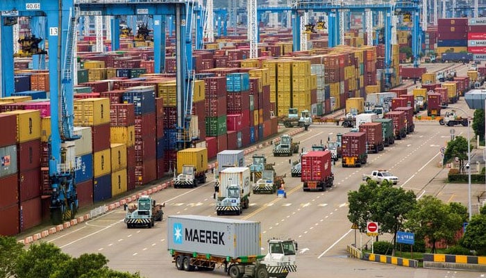 Lines of trucks are seen at a container terminal of Ningbo Zhoushan port in Zhejiang province, China. — Reuters/File