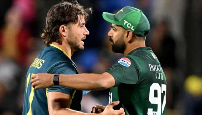 Australian batsman Marcus Stoinis (L) embraces Pakistan bowler Haris Rauf (R) after the third Twenty20 international cricket match between Australia and Pakistan at the Bellerive Oval in Hobart on November 18, 2024. — AFP