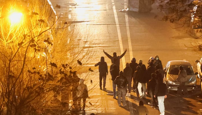 Iranian demonstrators gather in a street during a protest over the collapse of the currencys value, in Tehran, Iran, January 8, 2026. — Reuters