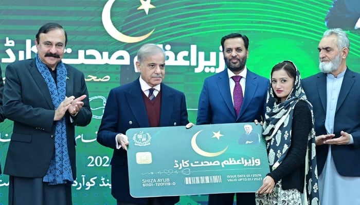 Prime Minister Shehbaz Sharif presents symbolic health card to resident of Azad Jammu and Kashmir to mark launch of PMs Health Card scheme, Islamabad, January 16, 2026. — X/@PTVNewsOfficial