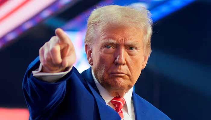 US President-elect Donald Trump gestures at Turning Point USAs America Fest in Phoenix, Arizona, US. — Reuters