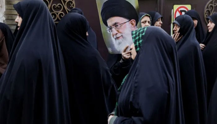 Citizens participate in a pro-government rally held in Tehran, Iran on January 12, 2026. — Reuters