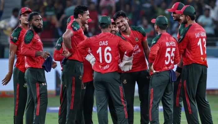 Bangladeshs Mustafizur Rahman (fourth from right) celebrates taking a wicket with teammates during their Mens T20 Asia Cup Super Four match against Sri Lanka in Dubai, September 20, 2025. — AFP