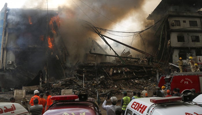 Flames and smoke rise from a fire that broke out in the Gul Plaza Shopping Centre in Karachi, Pakistan, January 18, 2026. — Reuters