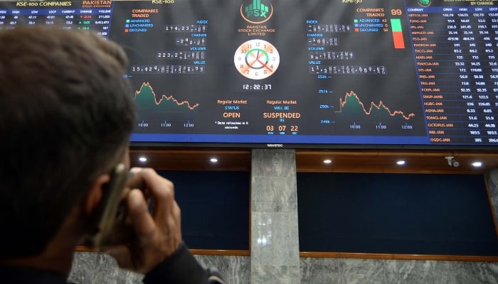 Broker is busy in trading at Pakistan Stock Exchange (PSX) in Karachi on Friday, January 2, 2026. — PPI
