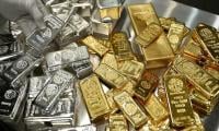 Gold, silver hit record highs as Trump's Greenland tariffs spark safety rally