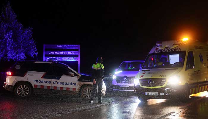An ambulance arrives at the scene of a commuter train derailment after a containment wall fell on the track due to heavy rain, killing the driver and injuring several people near Barcelona, in Gelida, Spain, January 21, 2026. — Reuters