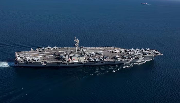 The Nimitz-class aircraft carrier USS Abraham Lincoln (CVN 72) transits the Strait of Gibraltar, entering the Mediterranean Sea as it continues operations in the 6th Fleet area of responsibility in this April 13, 2019 photo supplied by the U.S. Navy. — Reuters