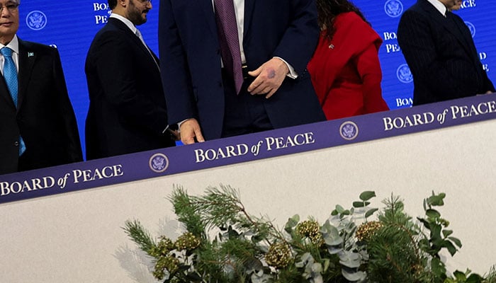 US President Donald Trumps bruised hand, as he attends a charter announcement for his Board of Peace initiative aimed at resolving global conflicts, alongside the 56th annual World Economic Forum (WEF), in Davos, Switzerland, January 22, 2026. — Reuters