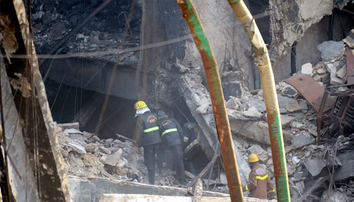 View of site after fire broken out incident at Gul Plaza shopping mall building as heavy machines and rescues officials are busy in rescue operation, at MA Jinnah road in Karachi on Wednesday, January 21, 2026. — PPI