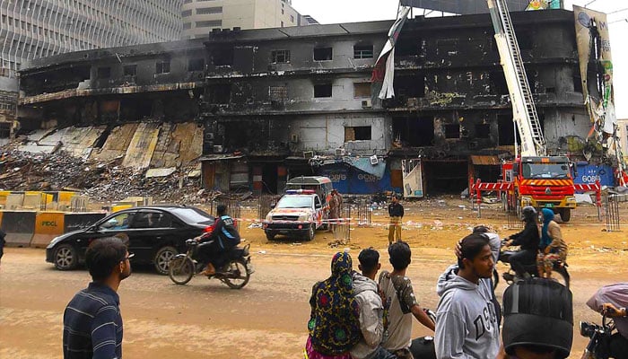 A view of burnt Gul Plaza shopping mall after a massive fire. The search operation at the fire-ravaged Gul Plaza building in Karachi entered its sixth day on Janaury 22, 2026. — INP