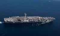 US naval fleet heads to Middle East as Trump warns Iran