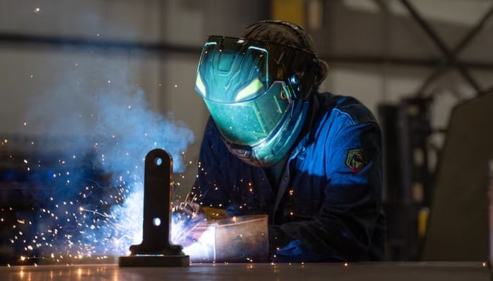 Joseph Paredes is pictured welding in Katy, Texas, US. — Reuters