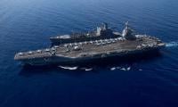 Iran issues 'all-out war' warning as US 'armada' advances 