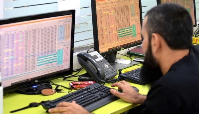 Broker is busy in trading at Pakistan Stock Exchange (PSX) in Karachi on Thursday, January 1, 2026. — PPI