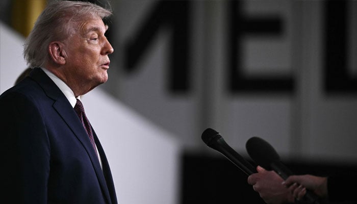 US President Donald Trump speaks to journalists as he attends the world premiere of Amazon MGM Studios´ Melania at the Kennedy Center in Washington, DC, on January 29, 2026. — AFP