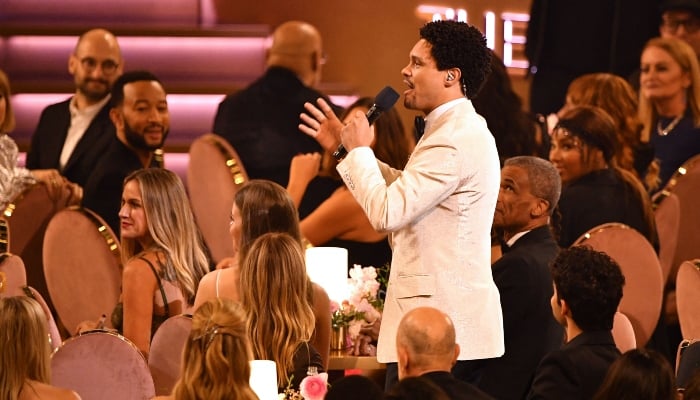 South African comedian and host Trevor Noah speaks during the 66th Annual Grammy Awards at the Crypto.com Arena in Los Angeles on February 4, 2024.— AFP