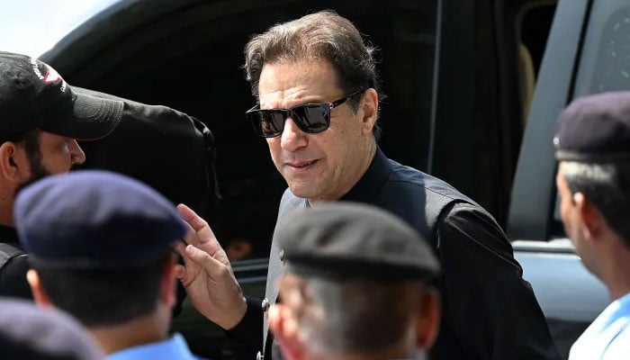 Pakistan Tehreek-e-Insaf (PTI) founder Imran Khan arrives to appear in the Supreme Court in Islamabad on July 24, 2023. — AFP