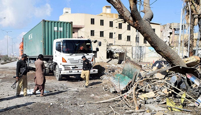Police officers inspect the site after militant attacks in Quetta on February 1, 2026. — Reuters
