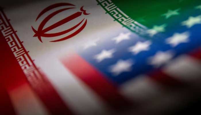 Irans and US flags are seen printed on paper in this illustration taken on January 27, 2022. —Reuters