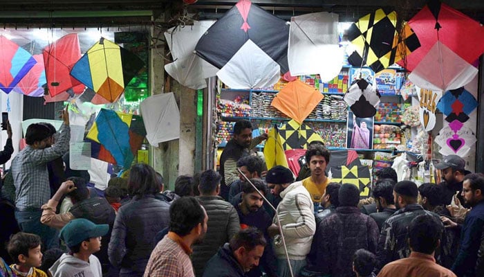 A large number of people selecting and purchasing the kites to celebrate the upcoming three-day kite flying festival (Basant) at local market in Lahore on February 2, 2026. — APP