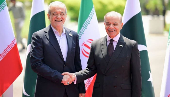 PM Shehbaz (right) receives Iranian president at PM House in Islamabad on August 3, 2025. — PID