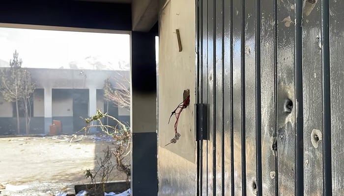 A view of a bullet-riddled door at a police station, following militant attacks, in Quetta, Pakistan, February 1, 2026.— Reuters