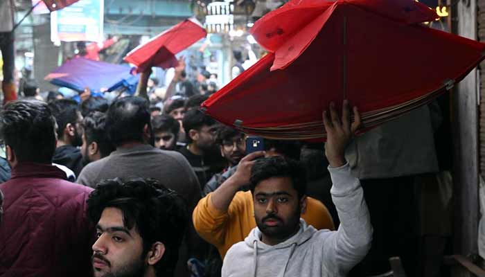 A large number of people purchase kites in connection with the upcoming Basant festival in the provincial capital.— APP