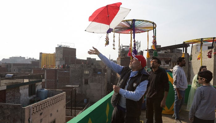 A man flies a kite from a rooftop to mark Basant, a kite-flying festival, in Lahore, February 6, 2026. — Reuters