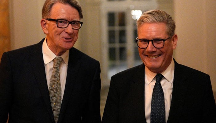 British Prime Minister Keir Starmer (right) talks with Britains ambassador to the United States Peter Mandelson during a welcome reception at the ambassadors residence, in Washington, DC, US, February. 26, 2025. — Reuters