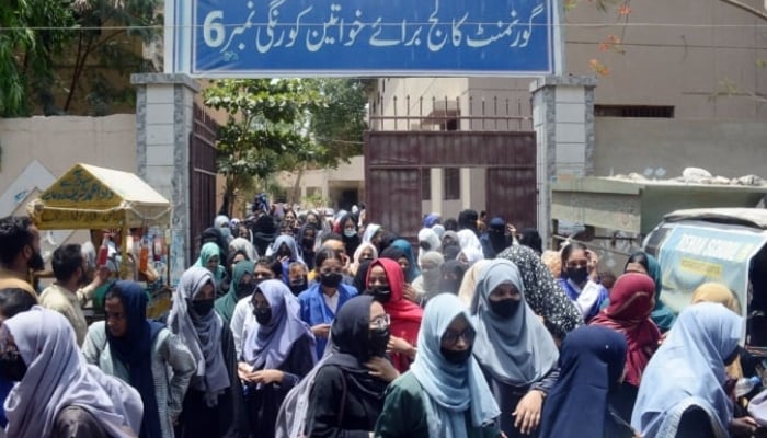 Students coming out of Women Girls College Korangi after appearing in their Intermediate examinations in Karachi, May 7, 2025. — APP