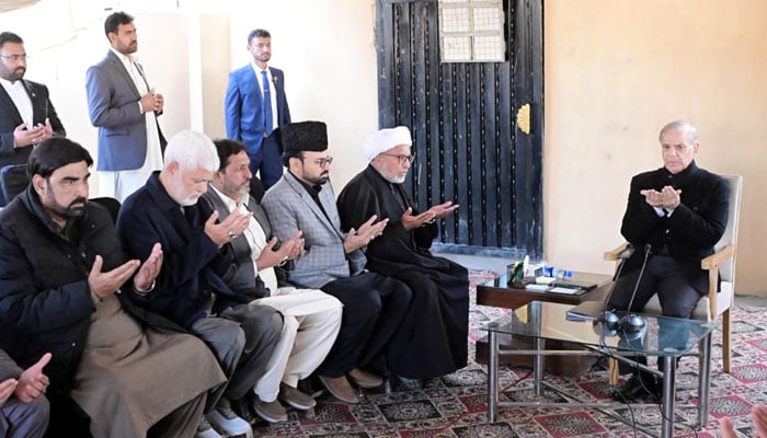 Prime Minister Shehbaz Sharif offers fateha for the martyrs of suicide attack on Imambargah Khadija-ul-Kubra in Islamabad on February 11, 2026. — APP