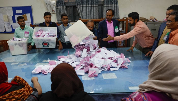 An electoral worker empties a ballot box as vote counting begins, during the 13th general election in Dhaka, Bangladesh, February 12, 2026. — Reuters