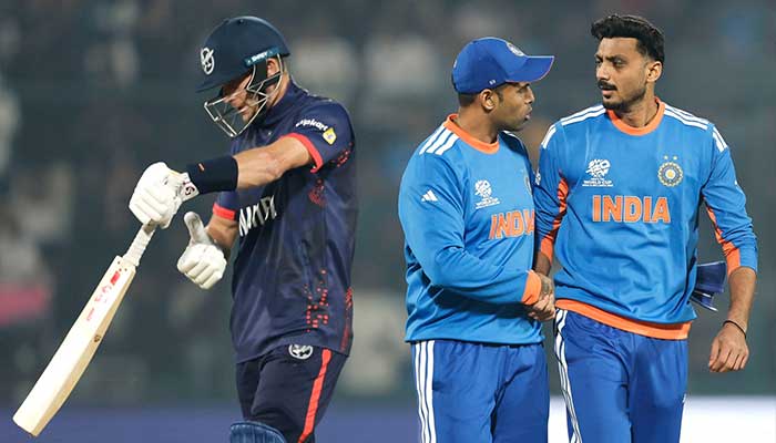 Indias Axar Patel (right) shaking hands with skipper Suryakumar Yadav (centre) after claiming wicket during the ICC Mens T20 World Cup group stage match against Namibia at Arun Jaitley Stadium, Delhi, on February 12, 2026. — Facebook/@IndianCricketTeam