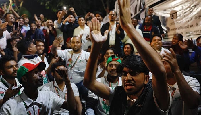 Supporters of the Bangladesh Nationalist Party (BNP) chant slogans as they celebrate unofficial news of Tarique Rahmans win in his constituency in the 13th general election near the partys Gulshan office in Dhaka, Bangladesh, February 12, 2026. — Reuters