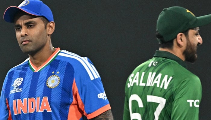 Pakistan captain Salman Agha (right) and Indian captain Surya Kumar Yadav at the toss before group-stage match between their sides in Colombo. — ICC