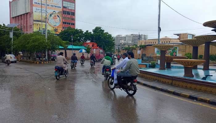 Commuters make way after rain in Karachi on September 10, 2025. — Geo.tv